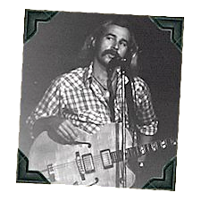 Photo of young Jimmy Buffett with a guitar